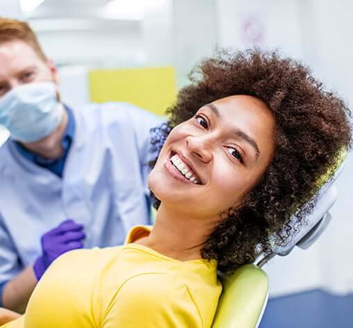 smiling woman at dentist