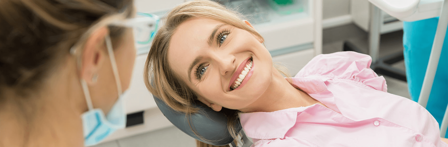 Smiling woman in dental chair