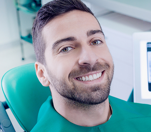 smiling man at the dentist