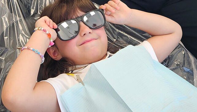 happy girl at the dentist