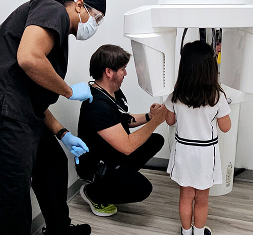 young girl at the dentist